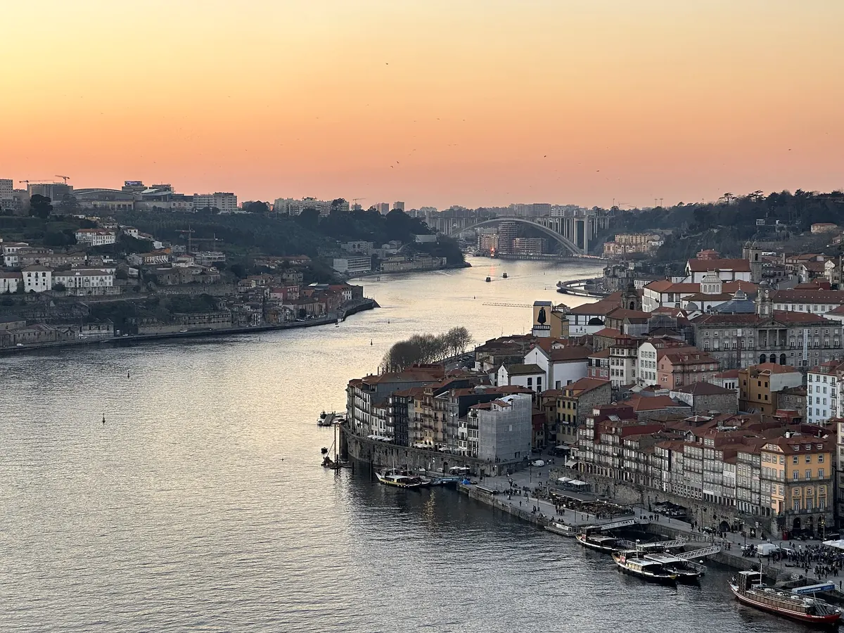 The Douro bending past Porto's old town at dusk